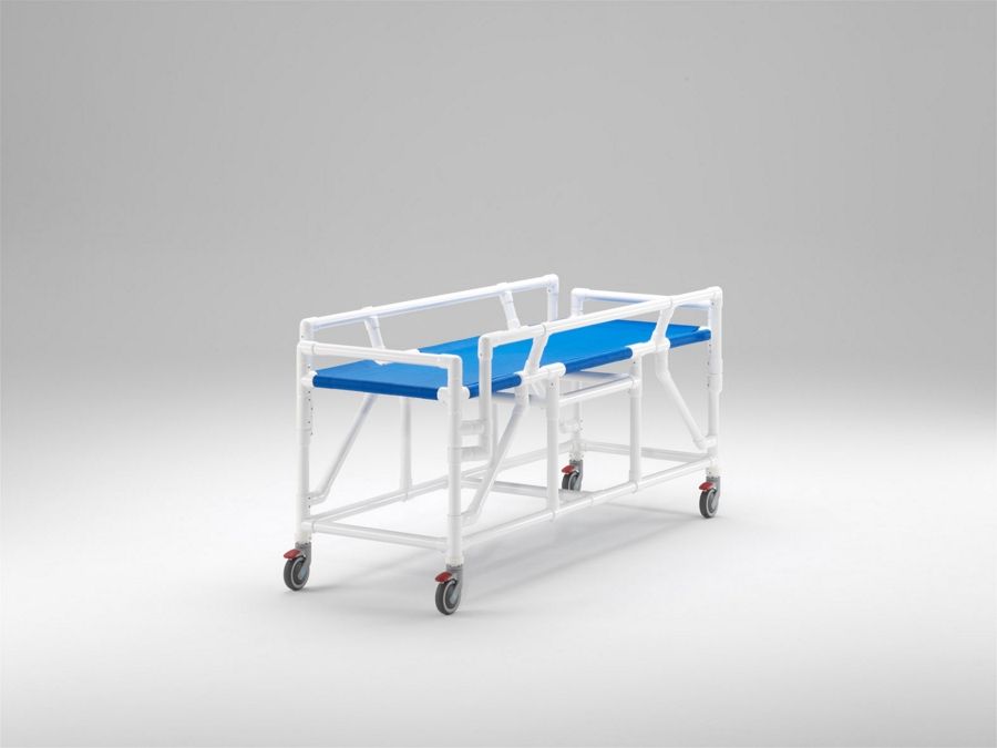 Carro camilla compatible con RM hasta 3 tesla con barreras laterales abatibles y superficie del paciente en tejido Textilene
